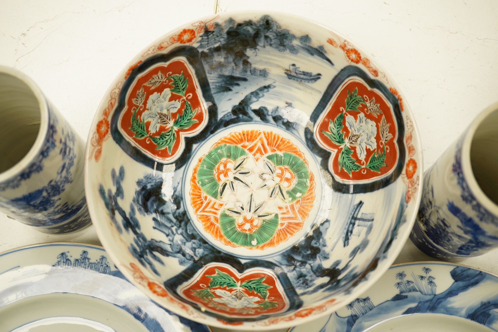 A pair of Chinese porcelain blue and white dishes, Kangxi, a pair of cylindrical vases and an Imari bowl (6). Condition - fair